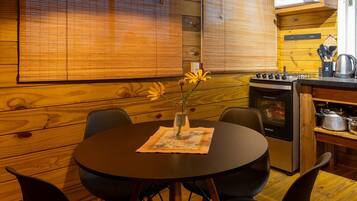 Honeymoon Cabin, Hot Tub, Lagoon View | Dining room