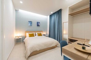 2 habitaciones, caja de seguridad en la habitación y escritorio 
