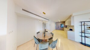 A modern kitchen with a built-in oven and a black metal shelf unit. - ♦King David Residences♦Stunning 2-Bdr with Balcony & Views♦ (Jerusalem)