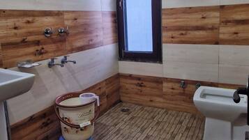 Deluxe Double Room, Balcony, Mountain View | Bathroom | Shower, slippers, towels, soap
