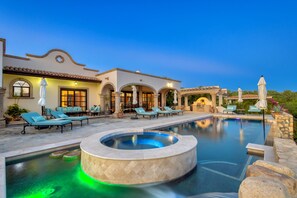 A pool area with lounge chairs and a hot tub. - Escape to Paradise in Cabo San Lucas! (Cabo San Lucas)