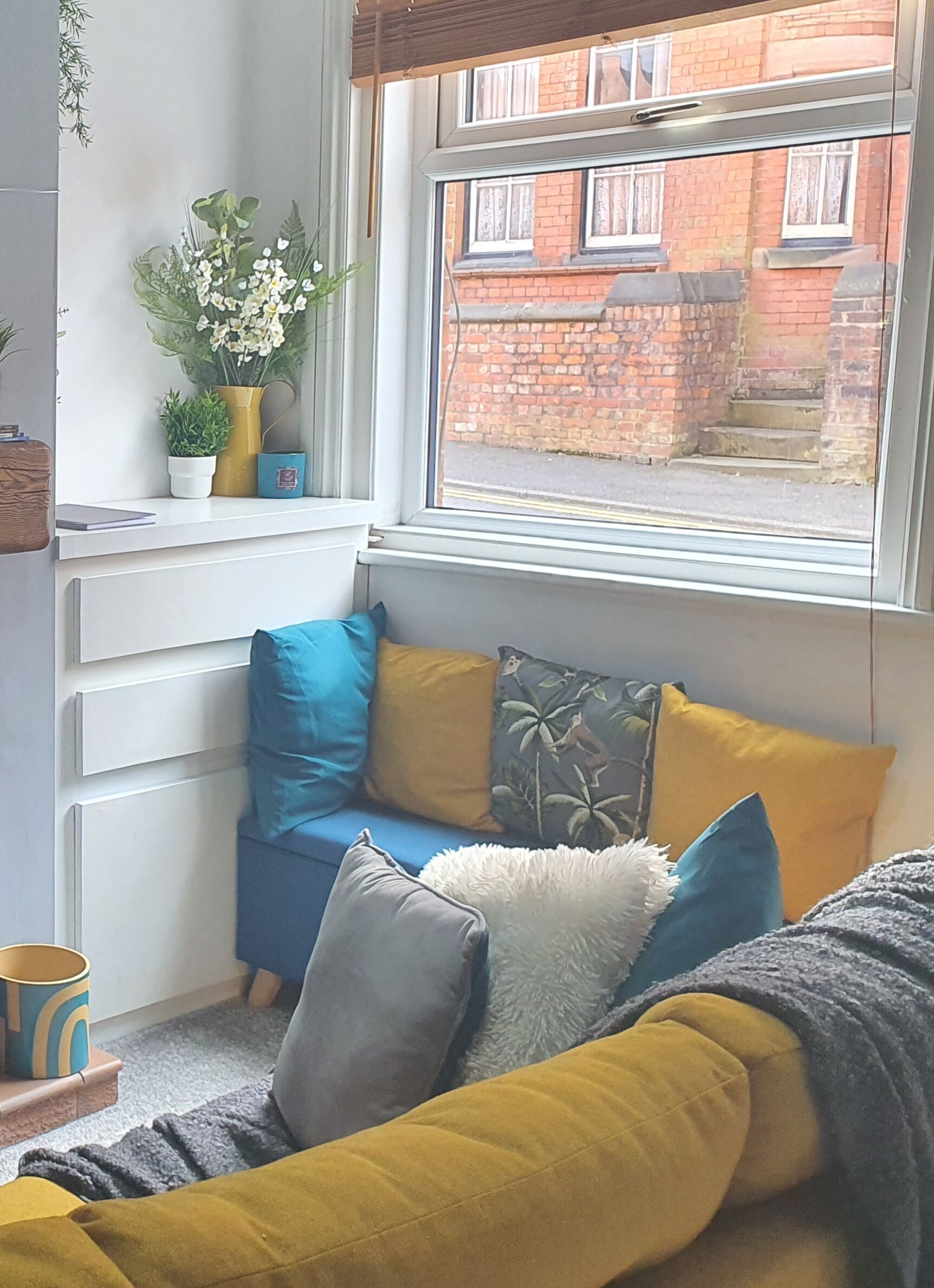 Our cosy window seat can fit 1 or 2 on it. My favourite spot in the house. 