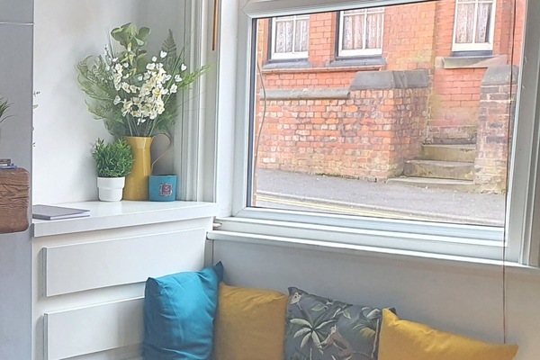 Our cosy window seat can fit 1 or 2 on it. My favourite spot in the house.