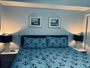 2 chambres, coffres-forts dans les chambres, fer et planche à repasser