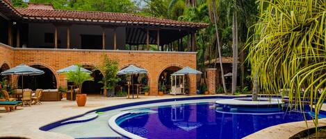 Outdoor pool, open 8:00 AM to 9:00 PM, pool umbrellas, pool loungers