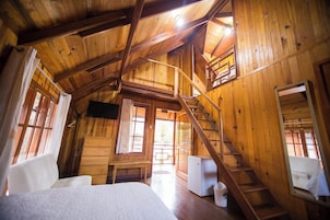 Cabaña Deluxe, vistas al jardín | Sistema de insonorización, cunas gratuitas, wifi gratis y ropa de cama