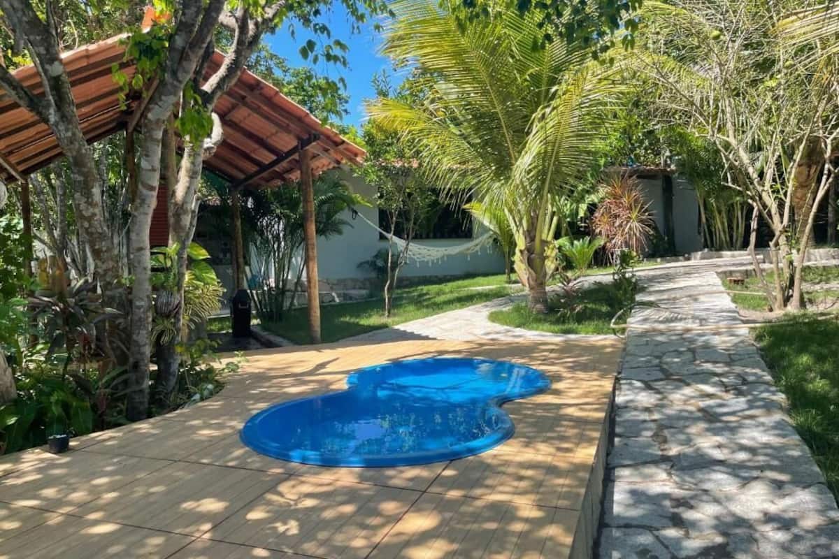 Family Chalet, Private Pool, Garden View | Living area | Flat-screen TV