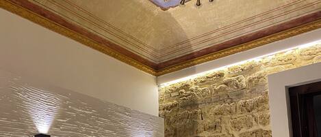 Deluxe Triple Room, Courtyard View | In-room safe, desk, laptop workspace, soundproofing