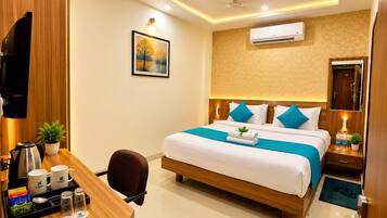 Deluxe Room | Desk, laptop workspace, free WiFi, bed sheets