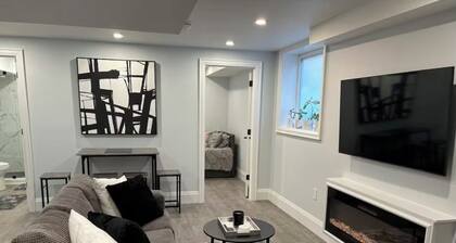 Modern, clean, bright two bedroom lower level look out duplex with large windows