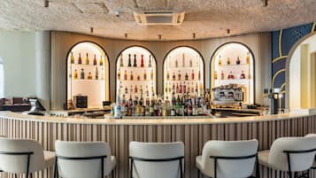 2 bars/lounges, rooftop bar