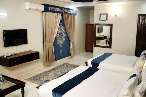 Chambres insonorisées, fer et planche à repasser, Wi-Fi gratuit