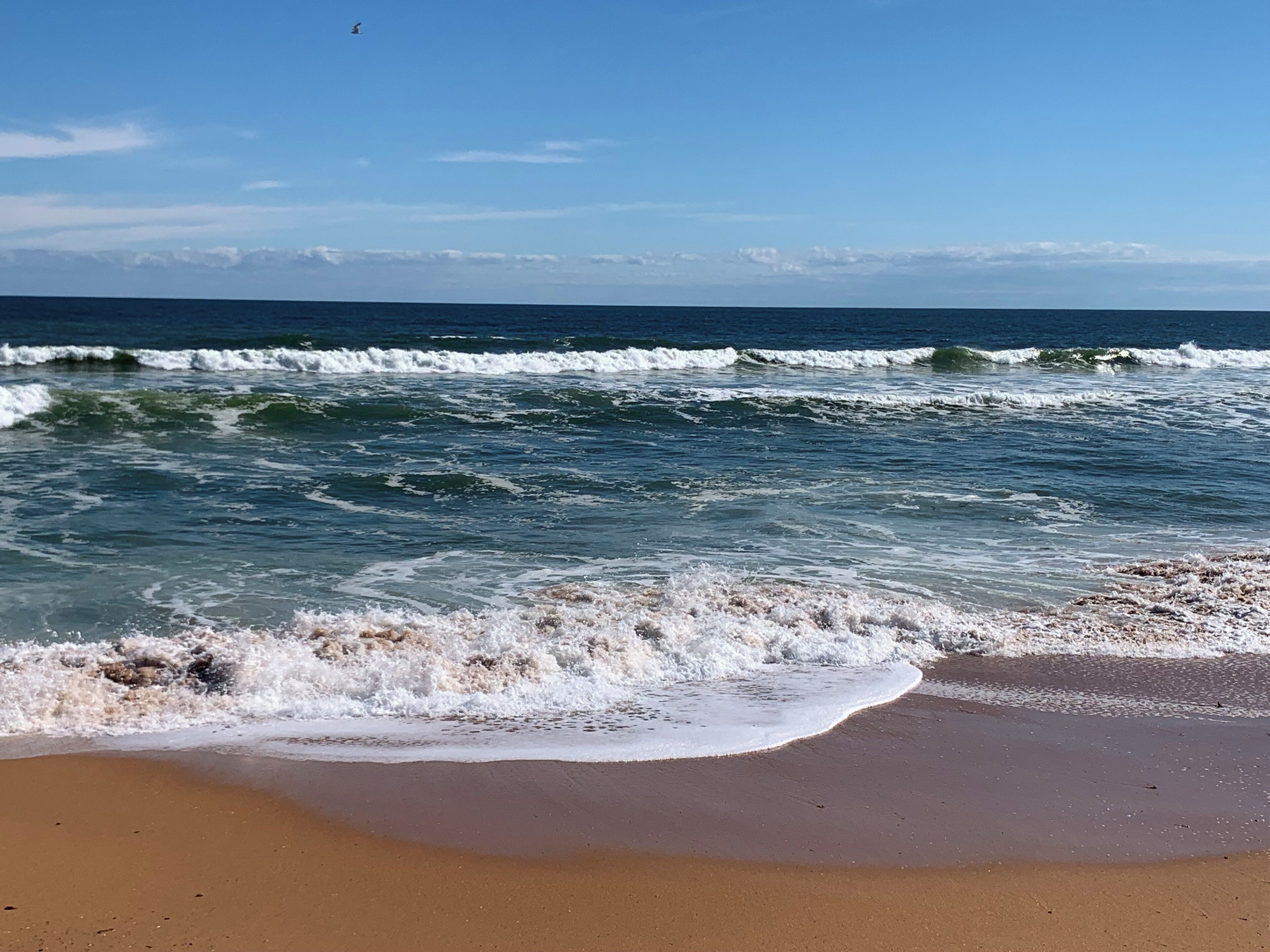 On the beach, sun loungers, beach towels