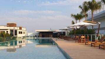 Luxury Apartment, Pool Access, City View | Pool | Indoor pool, 2 outdoor pools, sun loungers