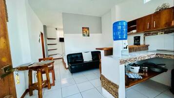 Apartment, Ocean View | Private kitchen | Fridge, microwave, stovetop, cookware/dishes/utensils