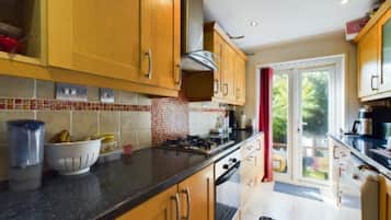 Fridge, oven, dishwasher, cookware/dishes/utensils