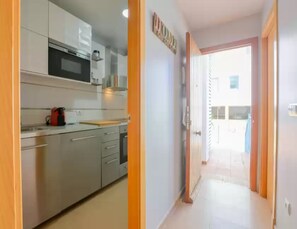 Appartement | Cuisine privée | Chaise haute