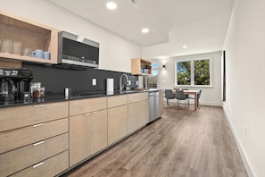 Comfort Apartment, Courtyard View | Private kitchen | Full-size fridge, microwave, dishwasher, cookware/dishes/utensils - Little Sugar Lofts (Bella Vista)