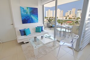 Basic Apartment | Living area | Flat-screen TV - Apartamentos Velas al Mar - by SOHO (Santa Marta)