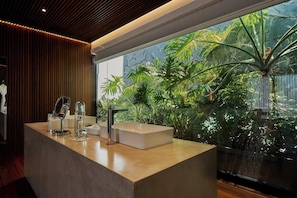 Superior Suite, City View | Bathroom | Shower, hair dryer, bathrobes, slippers