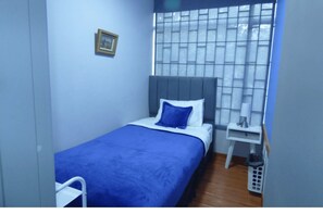 Chambre Simple Économique | Wi-Fi gratuit