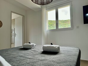 2 slaapkamers, een strijkplank/strijkijzer, wifi, beddengoed