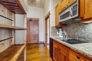 Fridge, microwave, stovetop, coffee/tea maker