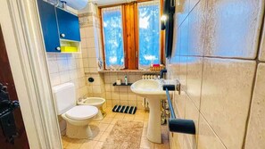 Een douche, een haardroger, handdoeken