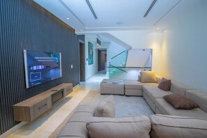 Appartement Deluxe, balcon, vue ville | Coin séjour