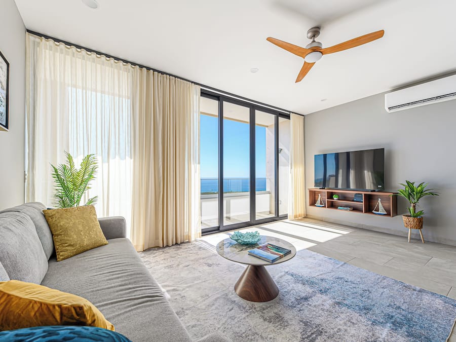Luxury Apartment, 2 Bedrooms, Pool Access, Ocean View 503 | Living area | 65-inch Smart TV with digital channels, Netflix, streaming services