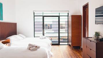Deluxe Triple Room, Multiple Beds, Private Bathroom, City View | Free WiFi