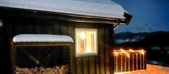 Moderne hytte midt i skibakken