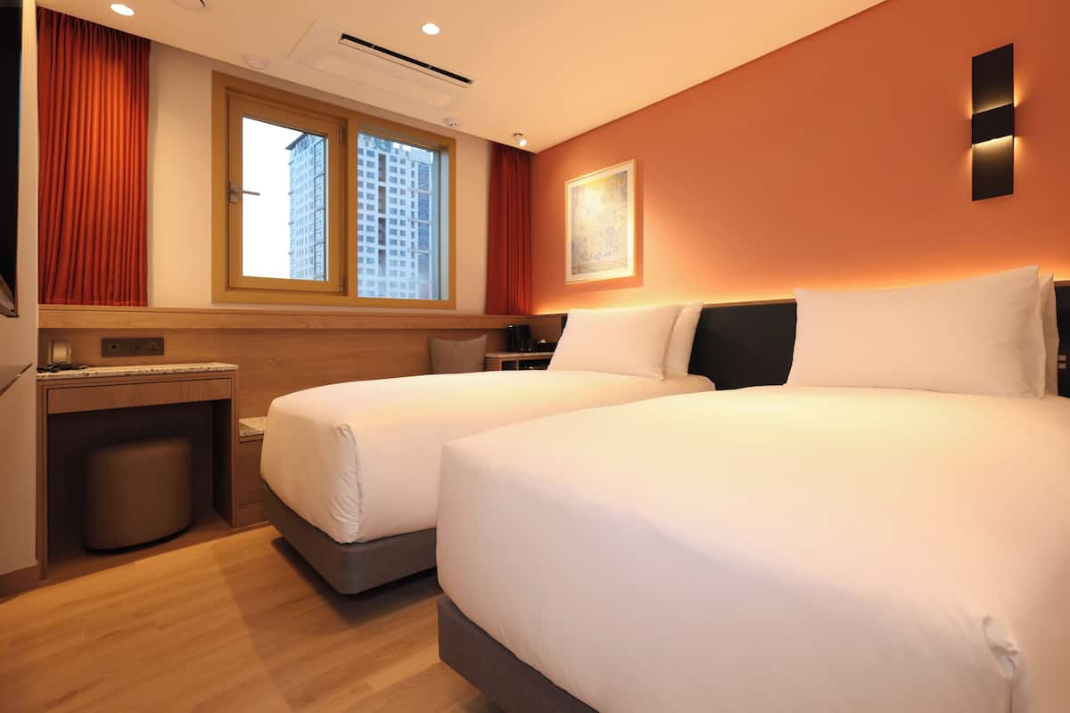Blackout drapes, WiFi (free), bed sheets