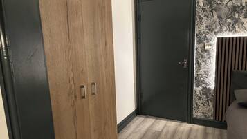 Apartment, Kitchen, Garden View | Desk, laptop workspace, blackout curtains, iron/ironing board