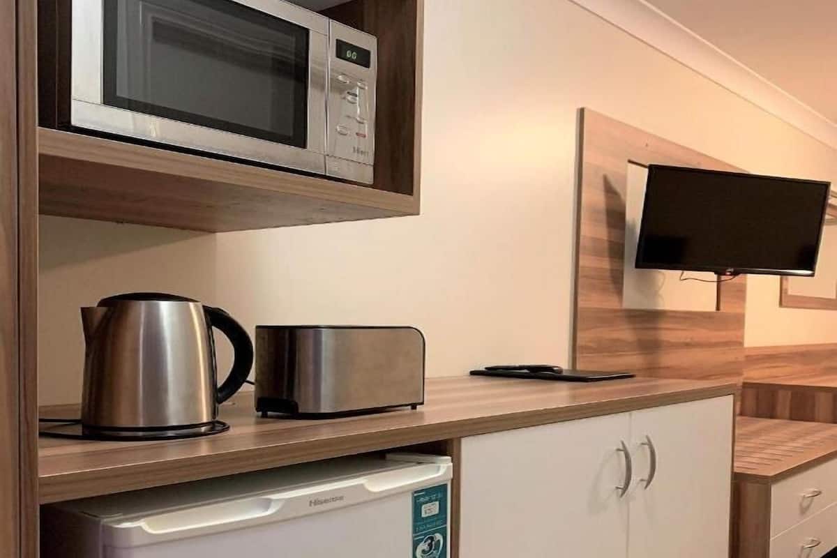 Premium bedding, desk, laptop workspace, free WiFi
