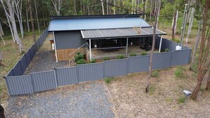 Unclassified image, 4 of 11, button - ISLAND HAVEN WOOD - COZY COTTAGE IN AMONGST THE GUMS TREES (Russell Island)