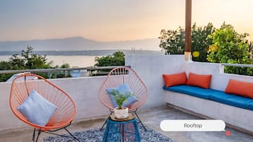 Deluxe Cottage, Garden View | Terrace/patio