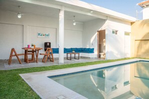 Outdoor pool, pool umbrellas, sun loungers