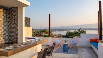 Deluxe Cottage, Garden View | Terrace/patio