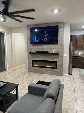 Smart TV, fireplace, video games, foosball