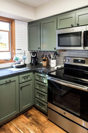 Fridge, microwave, oven, stovetop - Condo 23A in Mountain Harbor Resort (Mount Ida)