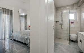 Villa | Bathroom | Shower, hair dryer