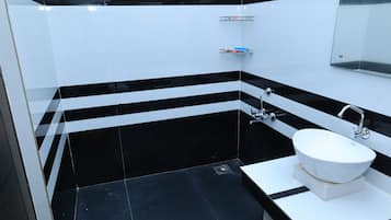 Shower, towels, soap, shampoo