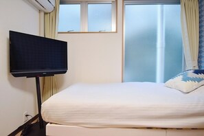 1 slaapkamer, een bureau, een strijkplank/strijkijzer, gratis wifi