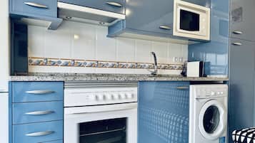 Fridge, microwave, coffee/tea maker, toaster