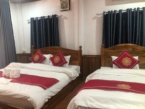 Deluxe Triple Room, Courtyard View - That Luang Place House (Luang Prabang)