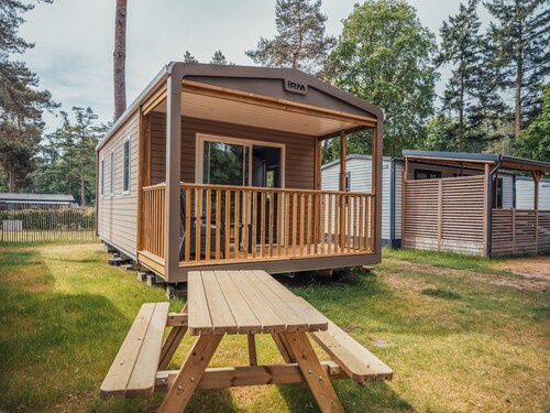 Modern chalet with luxury bathroom and screened porch