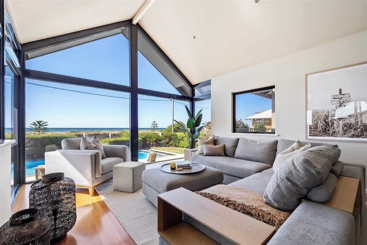 Unwind in plush comfort while gazing out at the endless blue horizon.