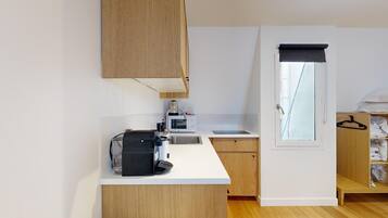 Fridge, microwave, coffee/tea maker, toaster