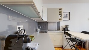 Fridge, microwave, coffee/tea maker, toaster